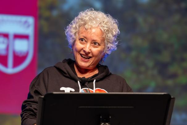 A speaker standing at a podium